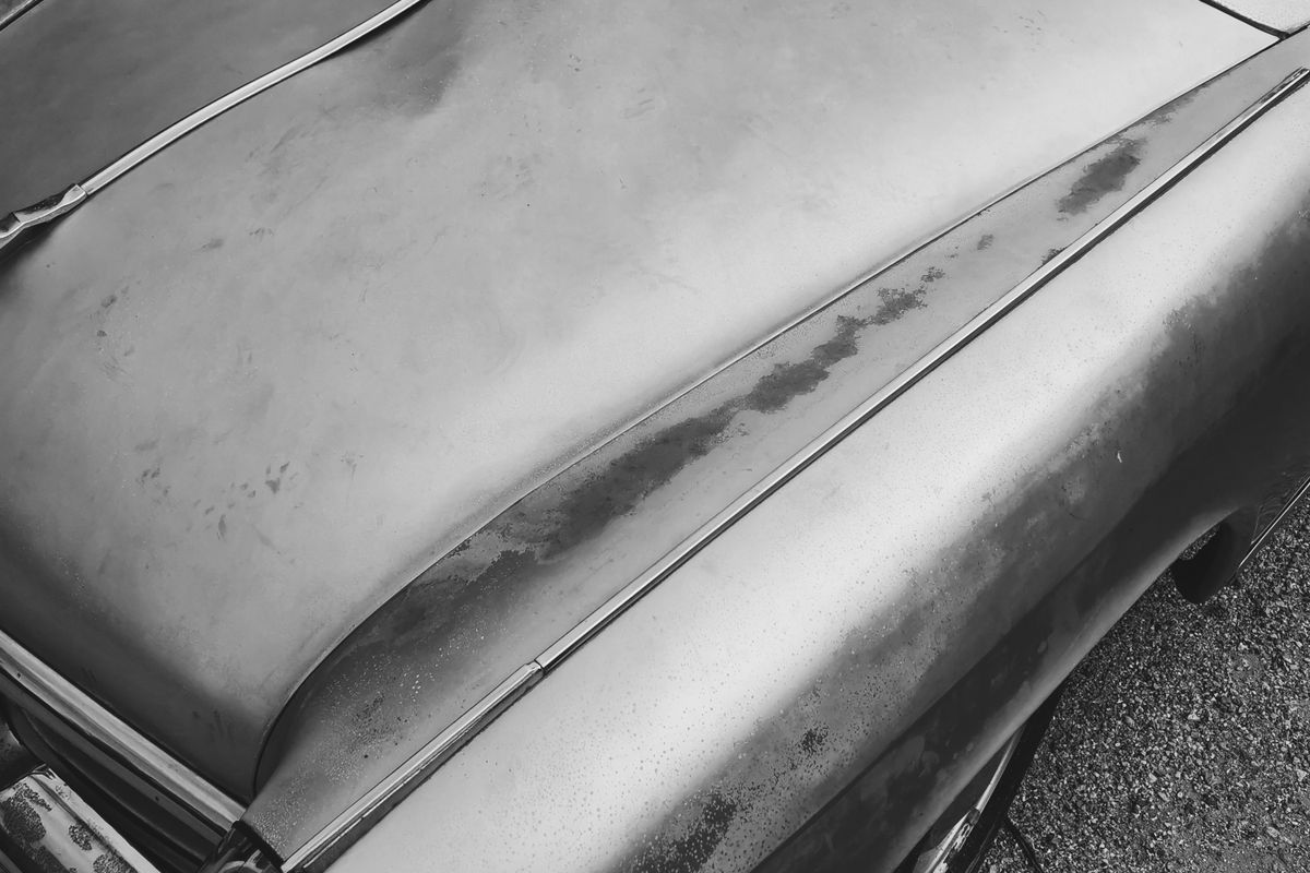 Dent and hail damage repair on a vehicle panel
